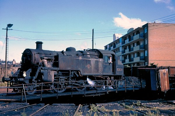 In a time honoured shot from Nine Elms, 82029 on the turntable